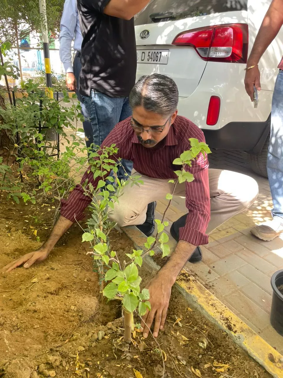 Tree planting activity at Extra Co facility